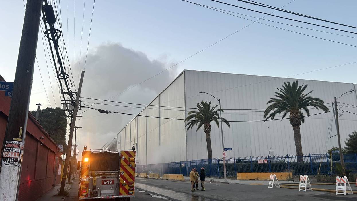 Fire crews continue battling flames inside Boyle Heights warehouse