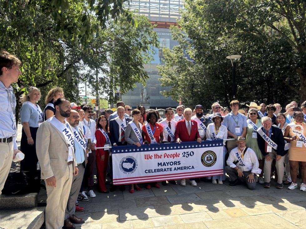 Mayors from around the country march through Philadelphia to mark nation’s 250th