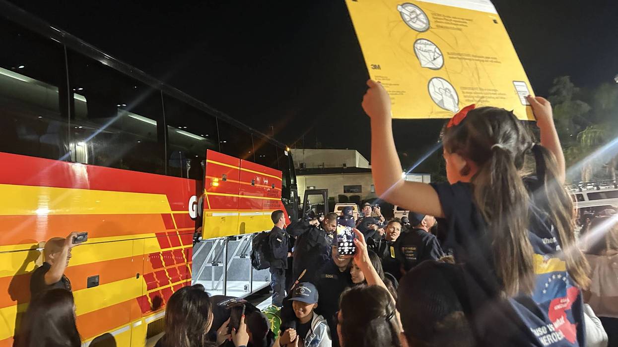 Members of L.A. County Fire Search and Rescue Team return from Venezuela