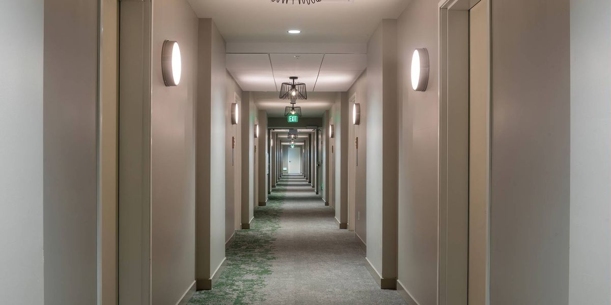 Men charged in hotel robbery