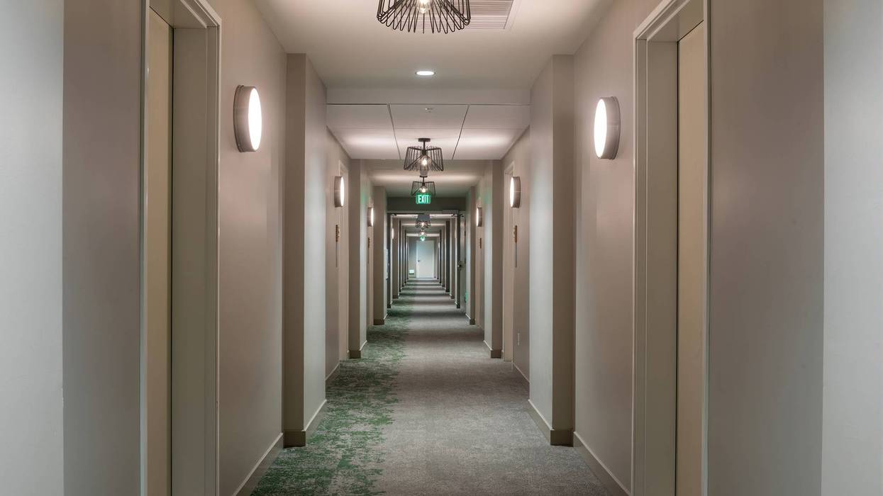 Men charged in hotel robbery