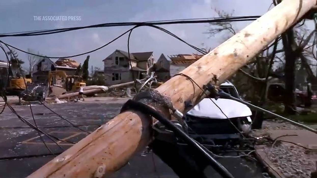 Tornado that carved a path of destruction in Wisconsin stayed on the ground for more than 20 minutes