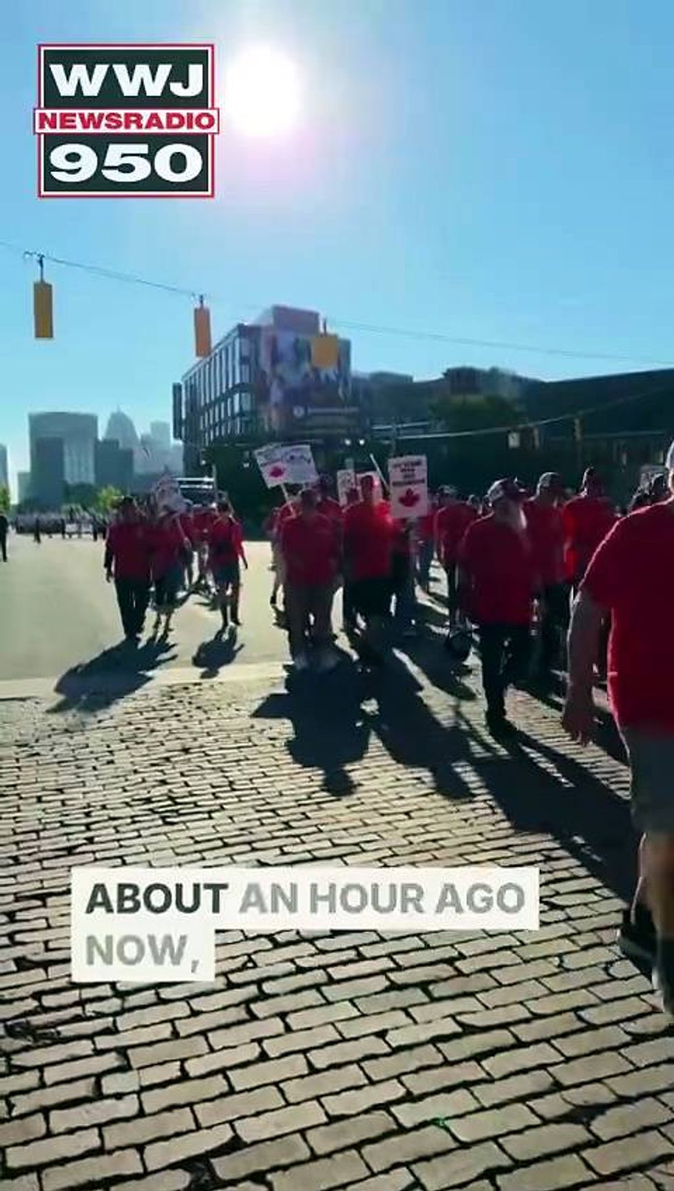 Labor leaders and workers march in Detroit parade