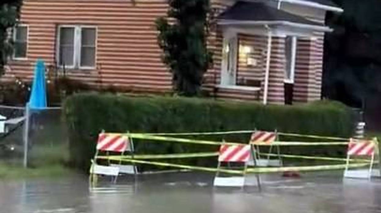 Detroit street flooded after car crashes into fire hydrant