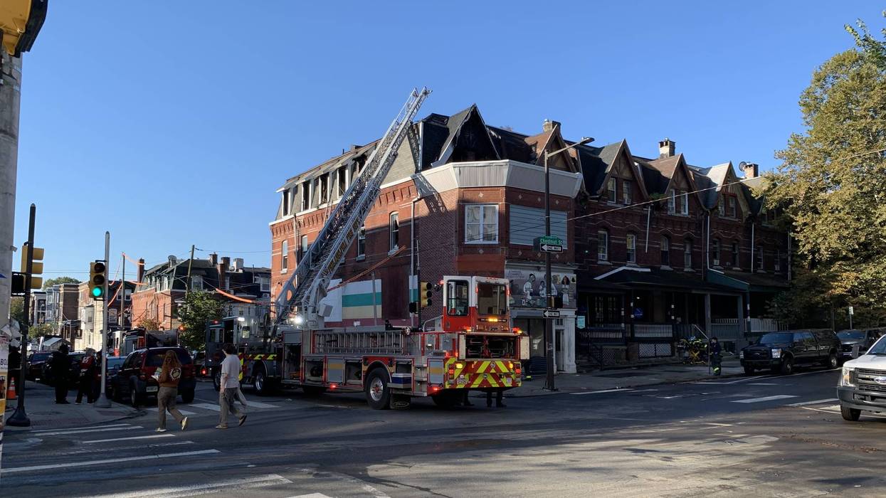 Man killed, firefighter injured in West Philadelphia row home fire