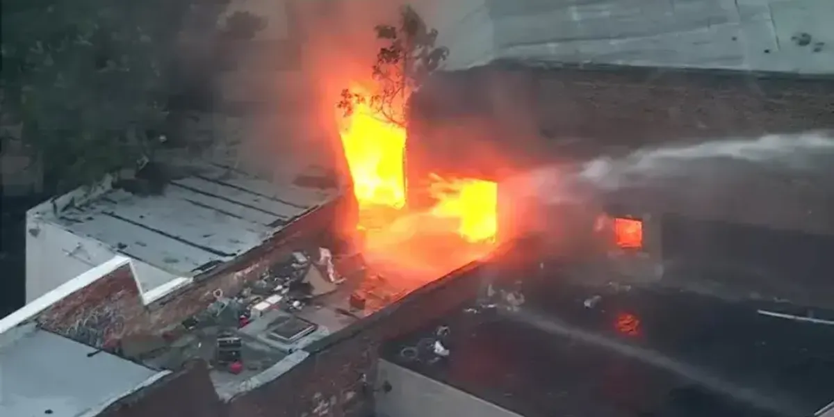 Firefighters battle two-alarm blaze at Kensington garage