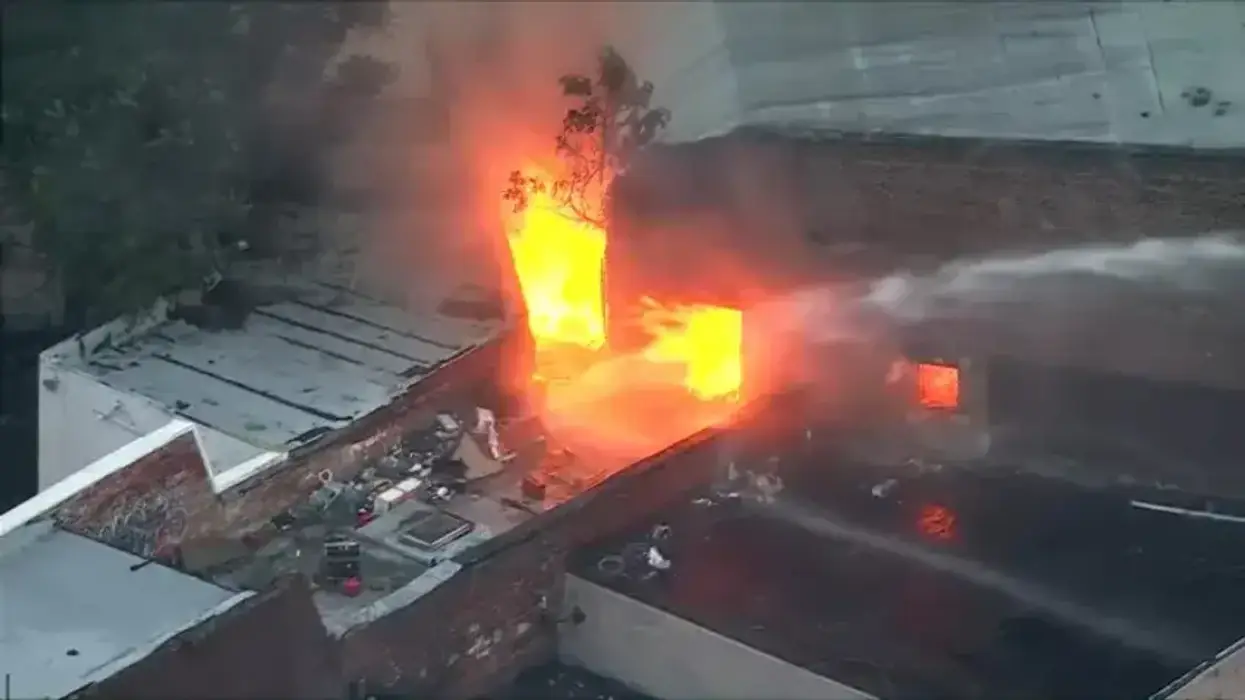Firefighters battle two-alarm blaze at Kensington garage