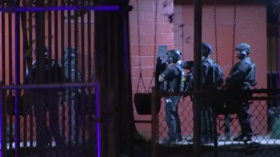 North Philly rec center worker crawls through ceiling during police barricade