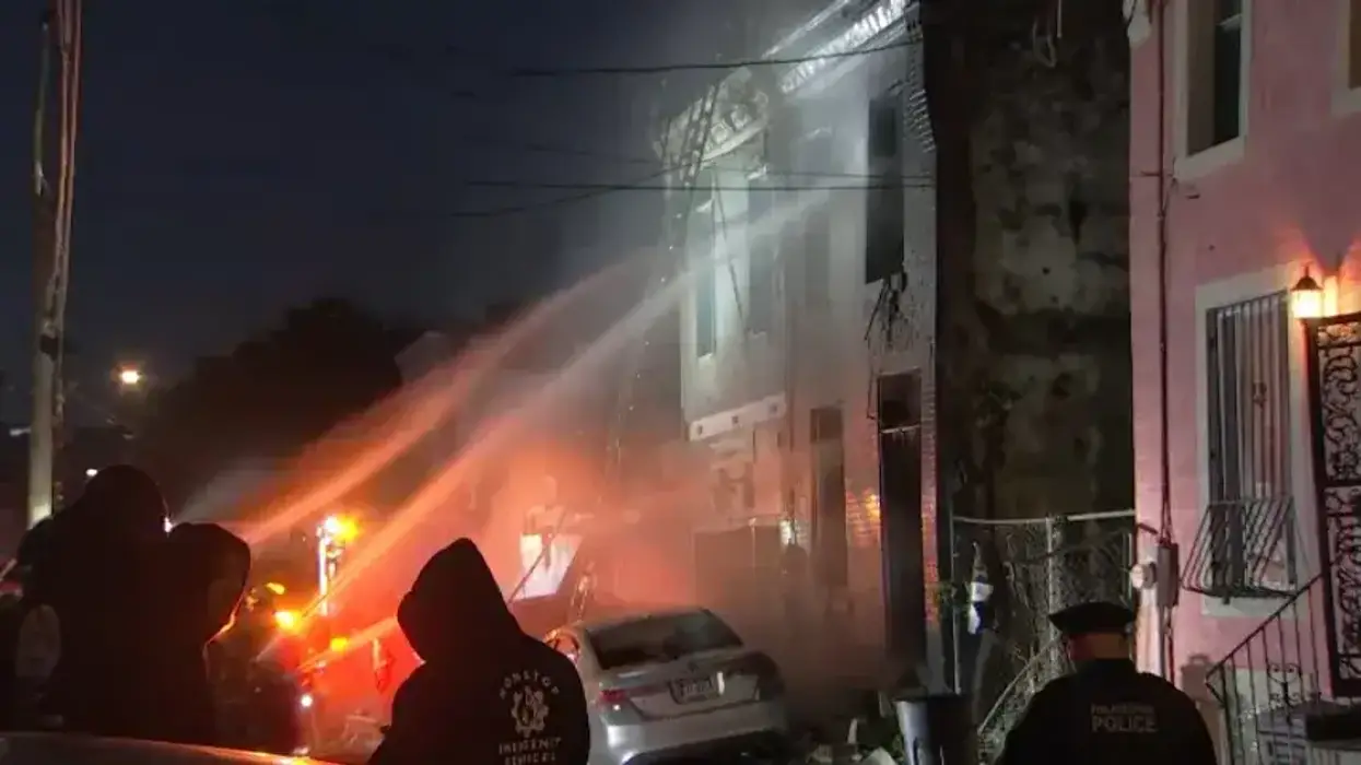 Woman injured in Kensington row home fire