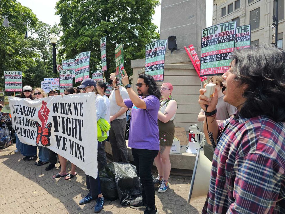 Immigrant rights advocates protest federal immigration enforcement at the Plaza Tenochtitlan in Chicago