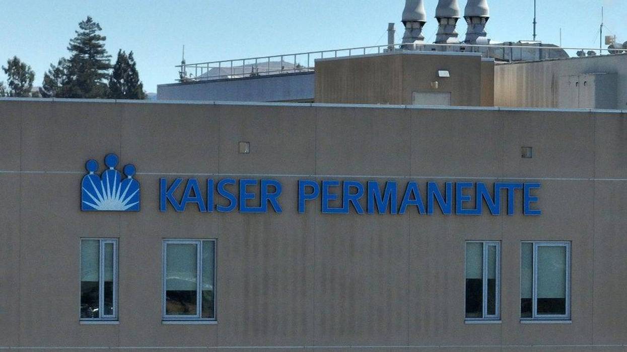 In an aerial view, a sign is posted on the exterior of the Kaiser Permanente Vallejo Medical Center on September 08, 2023 in Vallejo, California.