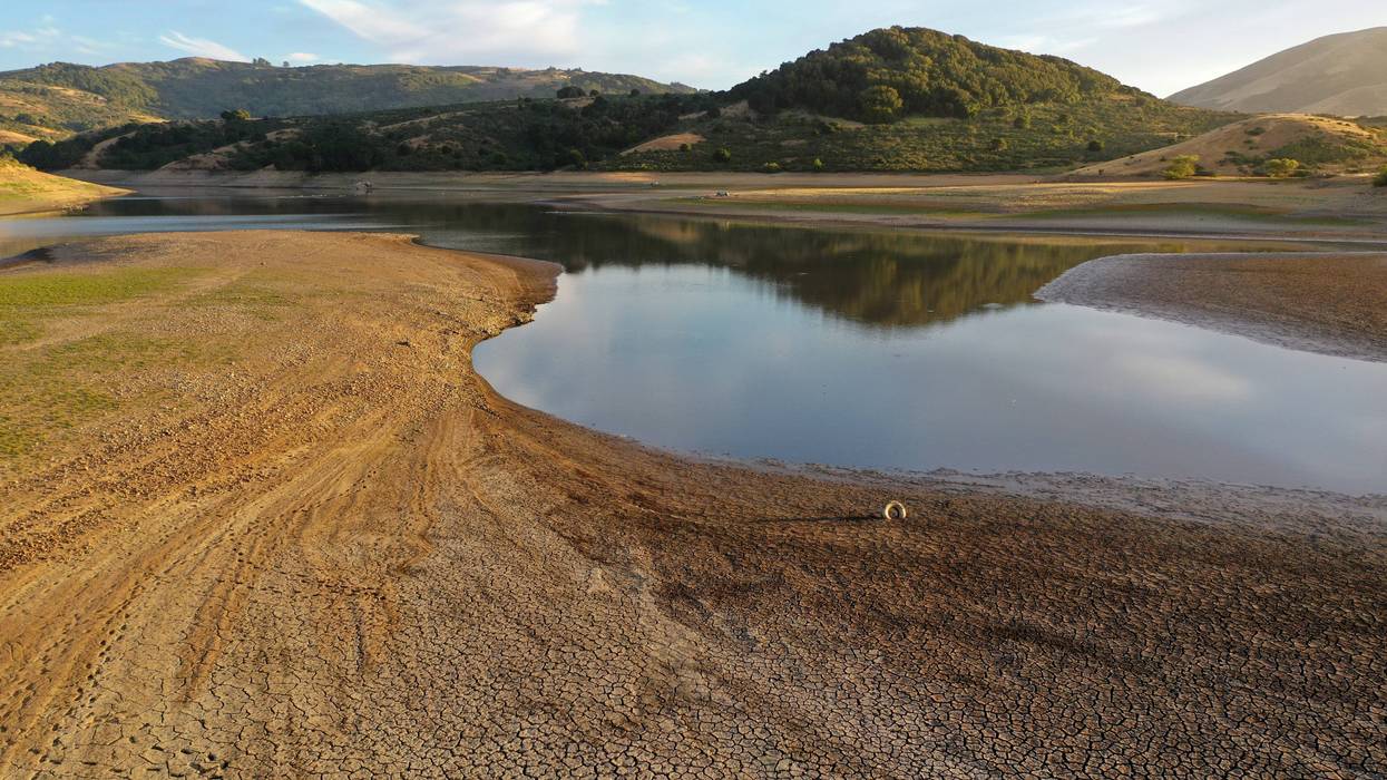 In an aerial view, dry cracked earth is visible at Nicasio Reservoir on June 16, 2021 in Nicasio, California.
