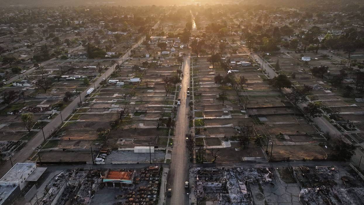 In an aerial view, properties are cleared of wildfire debris which burned in the Eaton Fire on May 22, 2025 in Altadena, California.