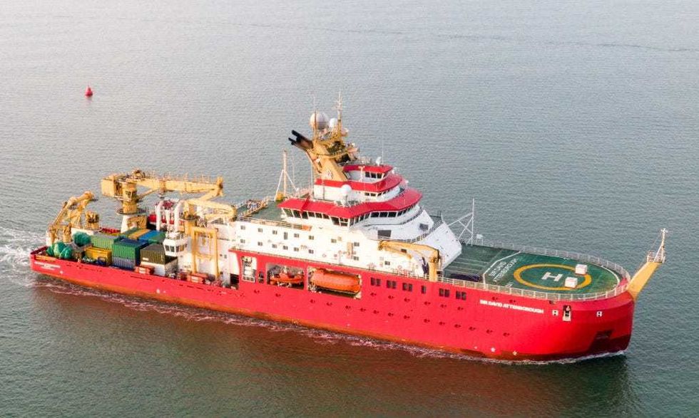In an aerial view, the RRS Sir David Attenborough arrives to refuel on November 17, 2021 in Portsmouth, England. The RRS Sir David Attenborough arrives in Portsmouth to take on fuel prior to departing the UK for its maiden voyage to Antarctica. The state-of-the-art research vessel will transfer station teams, food, cargo and fuel to British Antarctic Survey