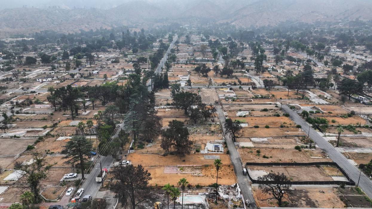 In an aerial view, U.S. Army Corps of Engineers contractors clear wildfire debris from the destroyed historic home (LOWER C) of late Los Angeles arts legend John Outterbridge, which burned in the Eaton Fire, on August 15, 2025 in Altadena, California.
