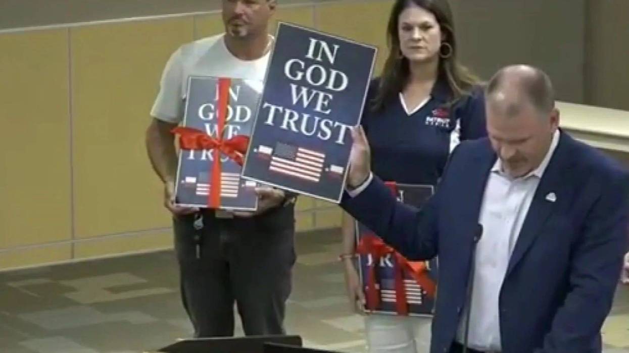 In God We Trust sign
