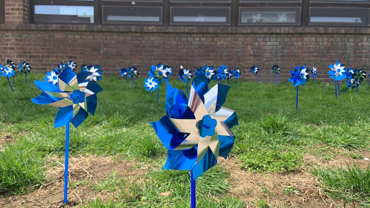 In observance of National Child Abuse Prevention Month, pre-K through eighth grade students “planted" 400 blue and silver pinwheels on the front lawn of Saint Pio’s Regional Catholic School in South Philadelphia.