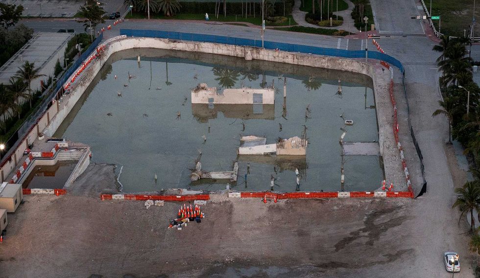 In this aerial view, the cleared lot that was where the collapsed 12-story Champlain Towers South condo building once stood on July 31, 2021 in Surfside, Florida. A total of 98 people died when the building partially collapsed on June 24, 2021.