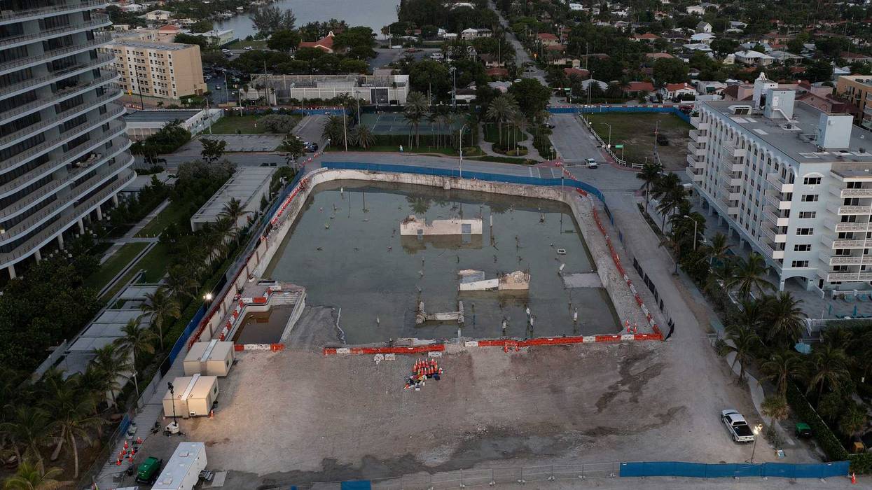 In this aerial view, the cleared lot that was where the collapsed 12-story Champlain Towers South condo building once stood on July 31, 2021 in Surfside, Florida. A total of 98 people died when the building partially collapsed on June 24, 2021.
