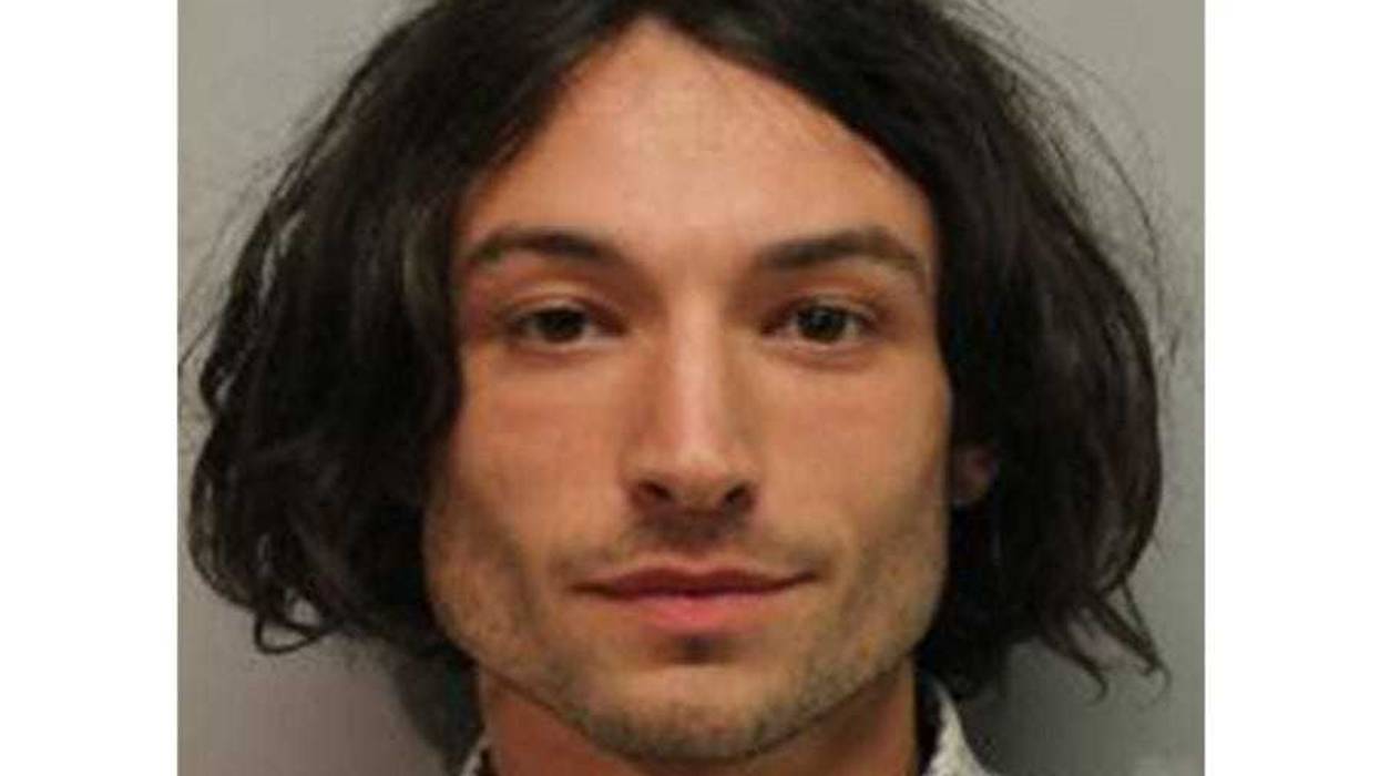 In this handout image provided by Hawaiʻi Police Department, Ezra Miller is seen in a police booking photo after his arrest for disorderly conduct and harassment on March 28, 2022 in Hilo, Hawaii.