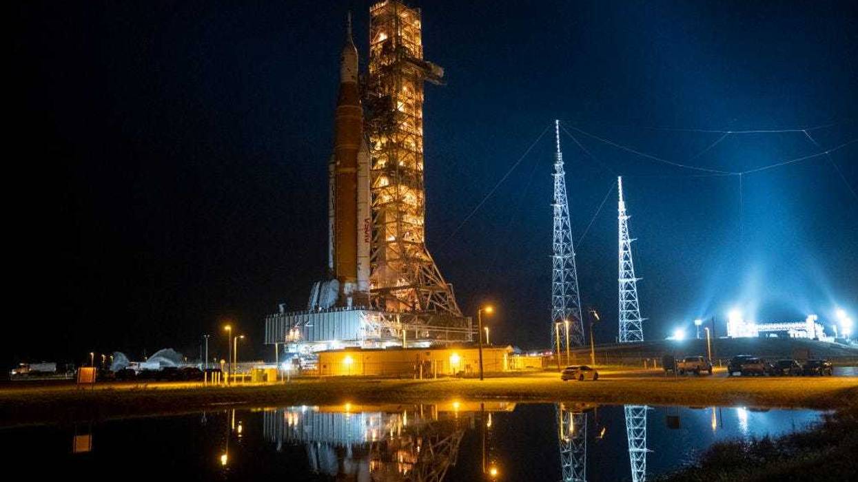 In this handout image provided by NASA, NASAs Space Launch System (SLS) rocket with the Orion spacecraft aboard is seen atop the mobile launcher as it is rolled back to the Vehicle Assembly Building from Launch Pad 39B at NASAs Kennedy Space Center on September 27, 2022 in Cape Canaveral, Florida. NASA made the decision to rollback based on the latest weather predictions associated with Hurricane Ian. NASAs Artemis I mission is the first integrated test of the agencys deep space exploration systems: the Orion spacecraft, SLS rocket, and supporting ground systems. (Photo by Joel Kowsky/NASA via Getty Images)