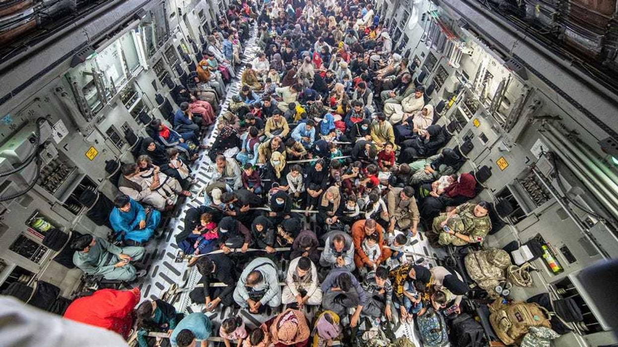 In this handout image provided by the Ministry of Defence, a full flight of 265 people are evacuated out of Kabul by the UK Armed Forces on August 21, 2021 in Kabul, Afghanistan. The British armed forces are evacuating UK citizens and eligible personnel out of the Afghan capital after the Taliban took control of the country last week.