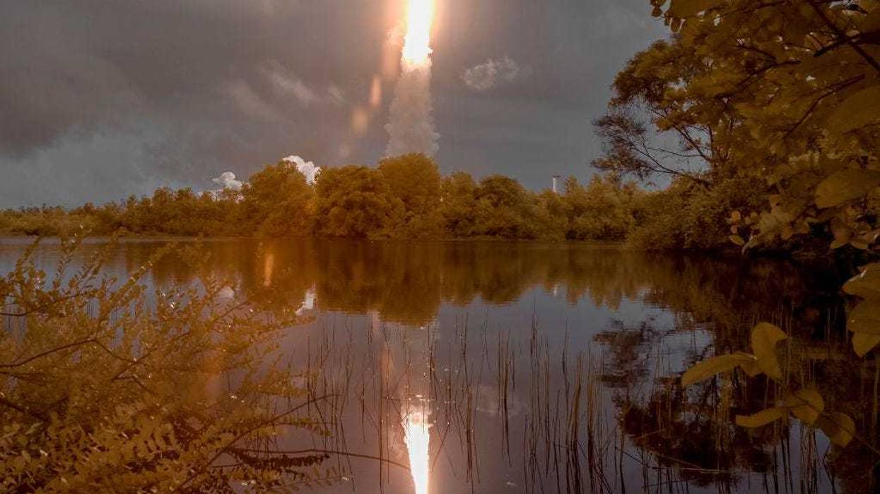 In this handout image provided by the U.S. National Aeronatics and Space Administration (NASA), Arianespace's Ariane 5 rocket launches with NASA's James Webb Space Telescope onboard, from the ELA-3 Launch Zone of Europes Spaceport at the Guiana Space Centre at Europes Spaceport, at the Guiana Space Center on December 25, 2021, in Kourou, French Guiana. The James Webb Space Telescope (sometimes called JWST or Webb) is a large infrared telescope with a 21.3 foot (6.5 meter) primary mirror. The observatory will study every phase of cosmic history from within our solar system to the most distant observable galaxies in the early universe. (Photo by Bill Ingalls/NASA via Getty Images)