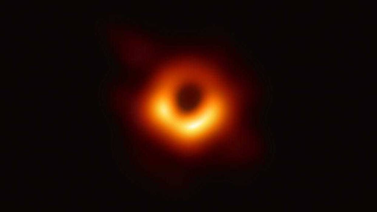 In this handout photo provided by the National Science Foundation, the Event Horizon Telescope captures a black hole at the center of galaxy M87, outlined by emission from hot gas swirling around it under the influence of strong gravity near its event horizon, in an image released on April 10, 2019.