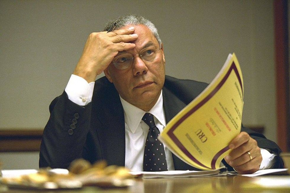 In this handout photo provided by the U.S. National Archives, Secretary of State Colin Powell meets in the President