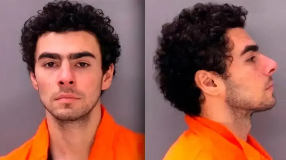 In this handout photo released by the Pennsylvania Department of Corrections, Luigi Mangione poses for a booking photo on December 10, 2024 in Huntingdon, Pennsylvania.