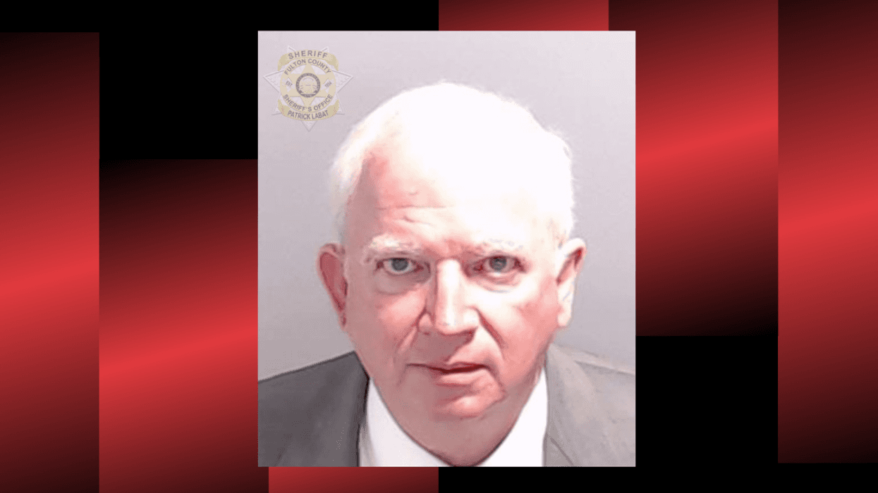 In this handout provided by the Fulton County Sheriff's Office, John Eastman, former lawyer to former U.S. President Donald Trump poses for his booking photo on August 22, 2023 in Atlanta, Georgia.