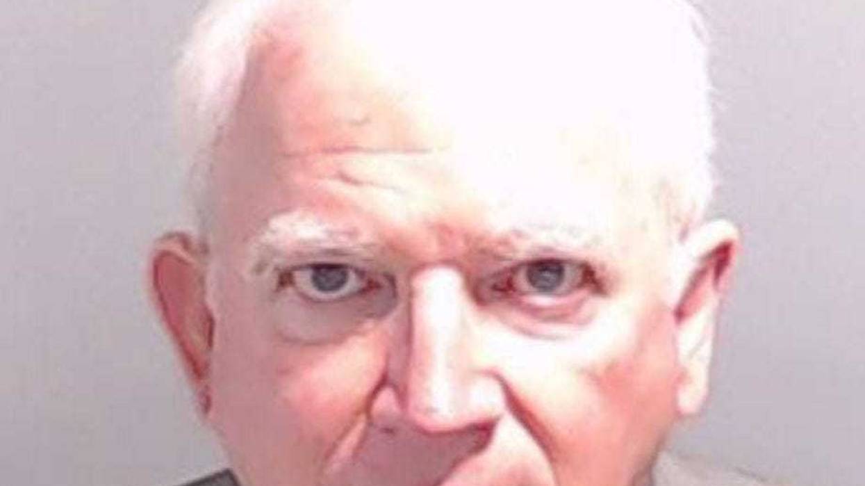 In this handout provided by the Fulton County Sheriff's Office, John Eastman, former lawyer to former U.S. President Donald Trump poses for his booking photo on August 22, 2023 in Atlanta, Georgia.