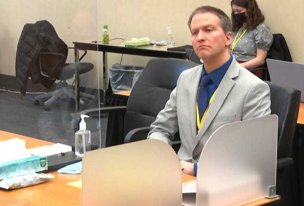 In this image from video, former Minneapolis police Officer Derek Chauvin listens as his defense attorney Eric Nelson gives closing arguments as Hennepin County Judge Peter Cahill preside Monday, April 19, 2021, in the trial of Chauvin at the Hennepin County Courthouse in Minneapolis.