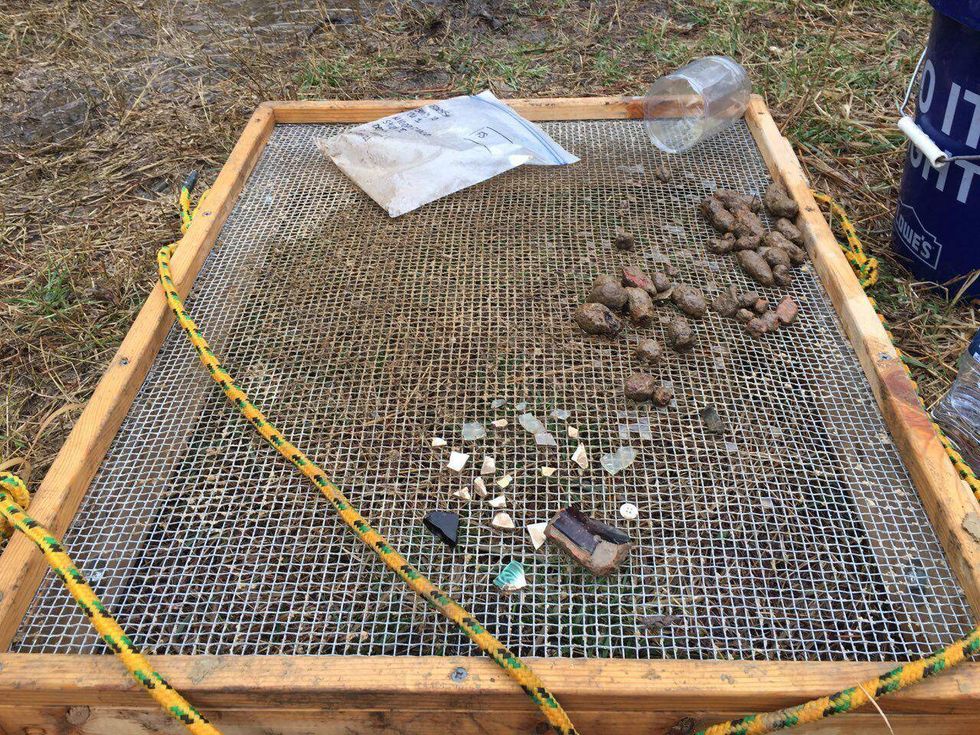 In this image provided by the Maryland Department of Transportation, items found at an archaeological site near Church Creek, Maryland, are displayed on March 25, 2021.