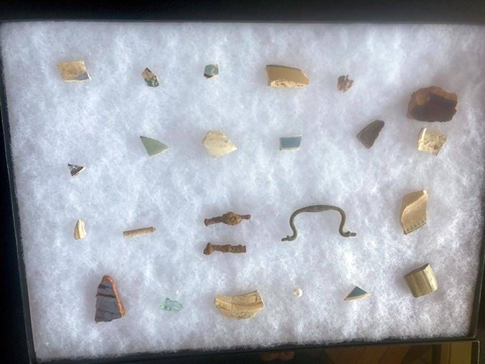 In this image provided by the U.S. Fish and Wildlife Service, items recovered from an archaeological site on Maryland