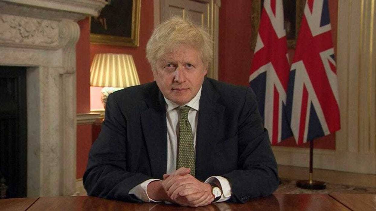 In this image taken from video, Britain's Prime Minister Boris Johnson makes a televised address to the nation from 10 Downing Street, London, Monday Jan. 4, 2021. (Pool via AP)