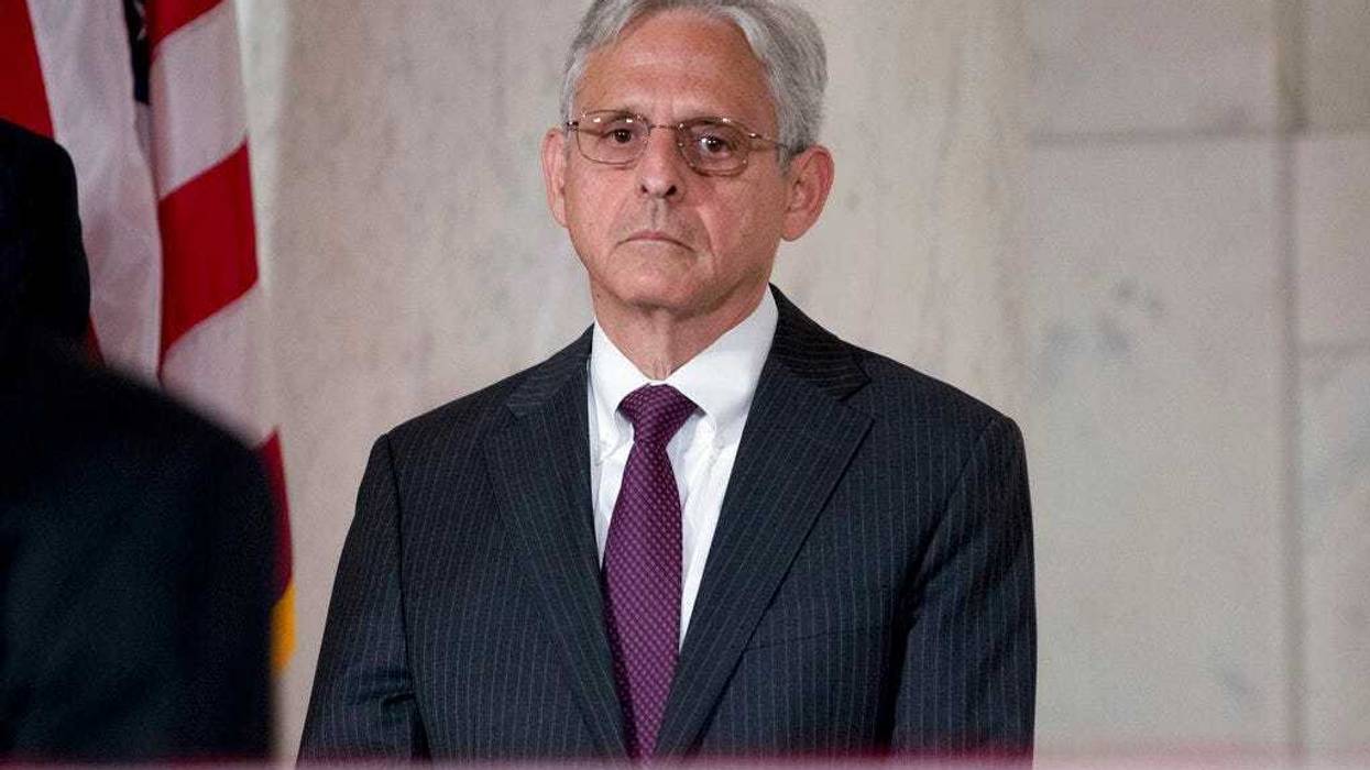 In this July 22, 2019, file photo, Merrick Garland pays his respects for the late Supreme Court Justice John Paul Stevens in the Great Hall of the Supreme Court in Washington. (AP Photo/Andrew Harnik, File)