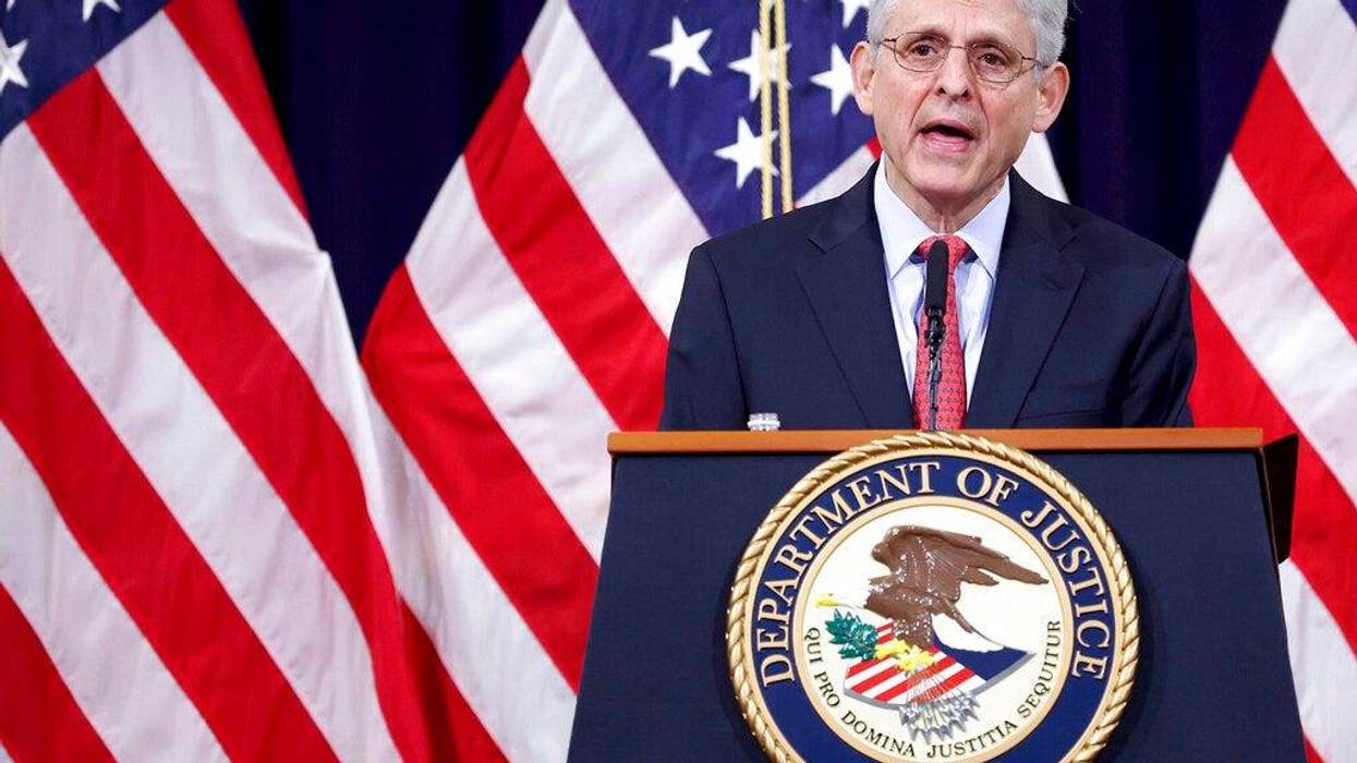 In this June 15, 2021, file photo Attorney General Merrick Garland speaks at the Justice Department in Washington. The Justice Department is suing Georgia over the state's voting laws, a person familiar with the matter said Friday, June 25.
