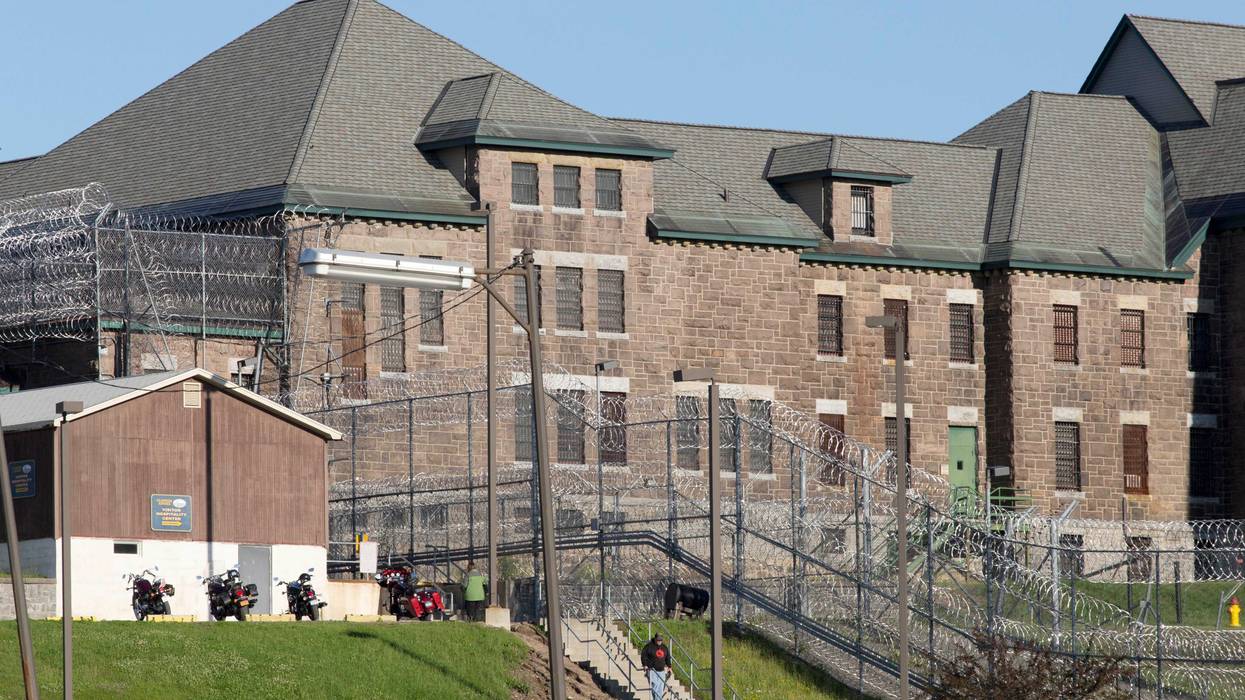 In this June 17, 2015 file photo, an employee leaves the Clinton Correctional Facility in Dannemora, N.Y.