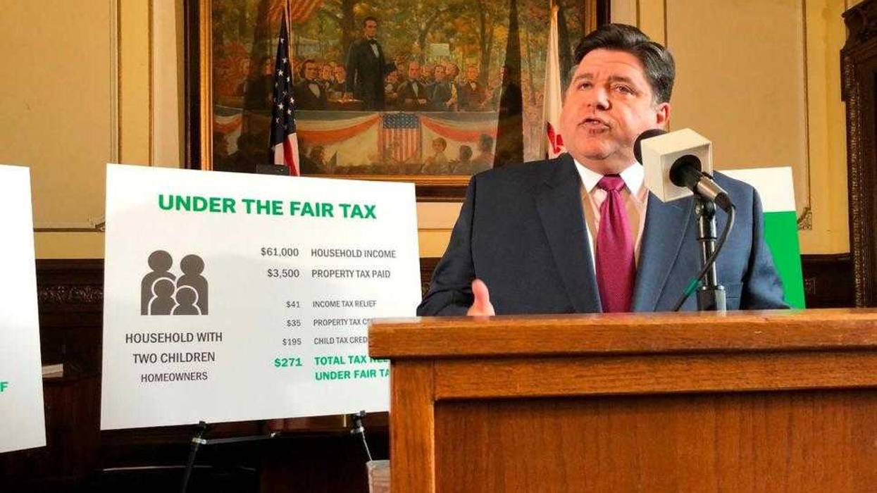 In this March 7, 2019, file photo, Gov. J.B. Pritzker outlines his plan to replace Illinois' flat-rate income tax with a graduated structure at the State Capitol in Springfield, Ill. Both sides in the debate over changing Illinois' income tax system from a flat-rate to a graduated structure, which voters face on this fall's election ballot, have straightforward arguments.