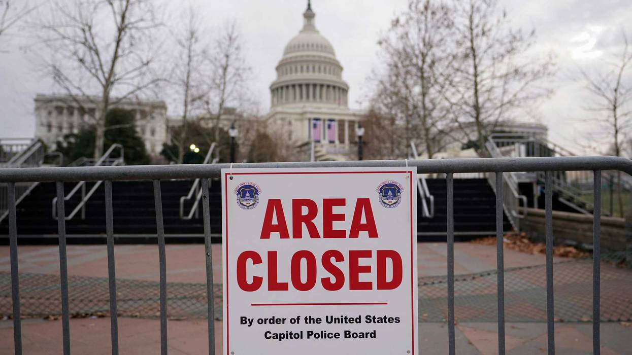 In this Monday, Jan. 11, 2021, file photo, signs are posted to close the area around the U.S. Capitol ahead of the inauguration of President-elect Joe Biden and Vice President-elect Kamala Harris in Washington.
