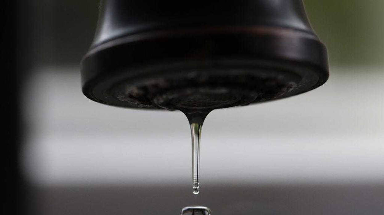 In this photo illustration, a drop of water falls from a tap on July 06, 2023 in San Anselmo, California.