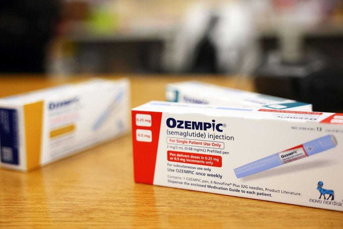 In this photo illustration, boxes of the diabetes drug Ozempic rest on a pharmacy counter on April 17, 2023 in Los Angeles, California.
