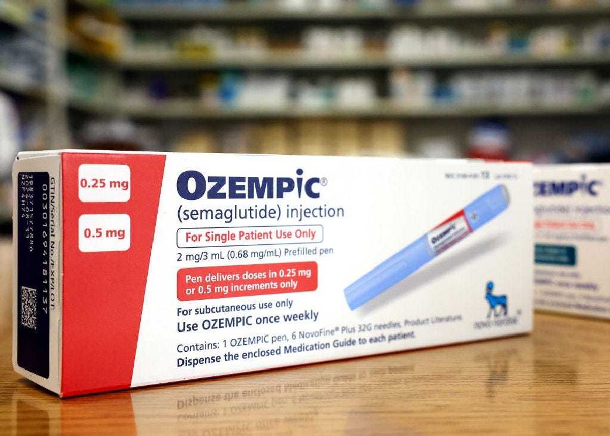 In this photo illustration, boxes of the diabetes drug Ozempic rest on a pharmacy counter on April 17, 2023 in Los Angeles, California.
