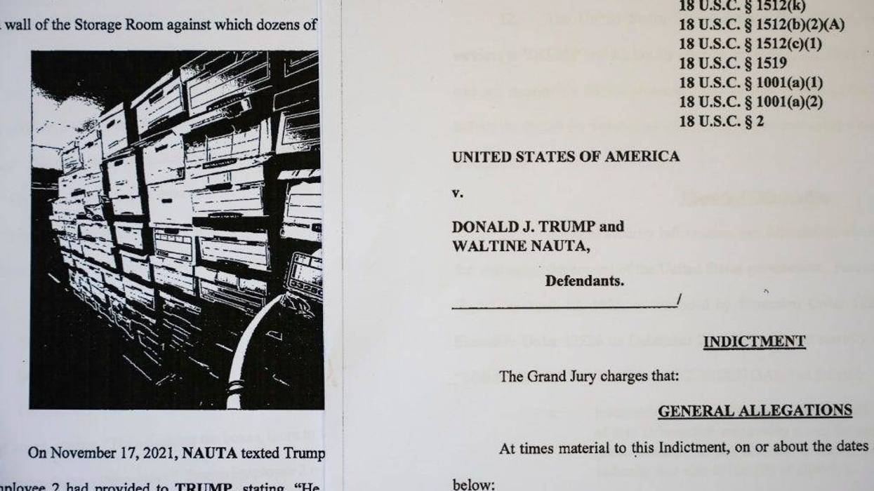 In this photo illustration, pages are viewed from the unsealed federal indictment of former U.S. President Donald Trump on June 9, 2023 in Washington, DC. Former U.S. President Donald Trump has been indicted on 37 felony counts in Special Counsel Jack Smith's classified documents probe. (Photo Illustration by Drew Angerer/Getty Images)