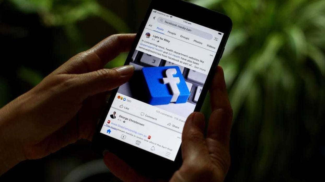 In this photo illustration reports on Facebook's news ban on Australian and International content on February 18, 2021 in Sydney, Australia.