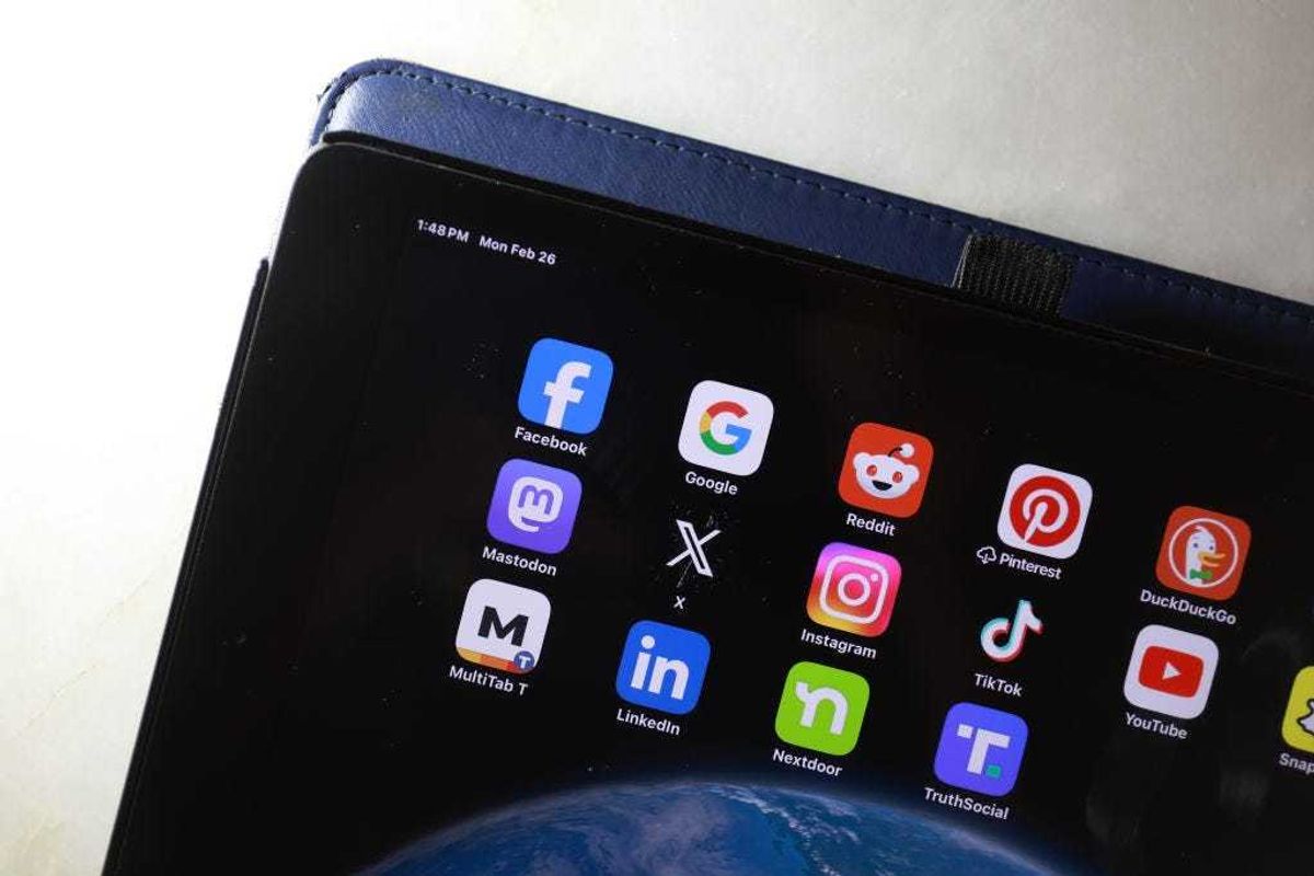 In this photo illustration, social media apps are displayed on an iPad on February 26, 2024, in Miami, Florida. The US Supreme Court is hearing a case on whether to give Texas and Florida significantly more control over social media platforms and their content.