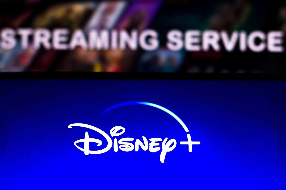 In this photo illustration the Disney + (Plus) logo seen displayed on a smartphone screen.