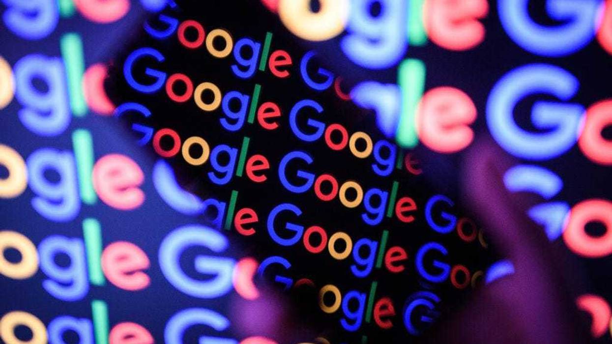 In this photo illustration, The Google logo is displayed on a mobile phone and computer monitor on August 09, 2017 in London, England. Founded in 1995 by Sergey Brin and Larry Page, Google now makes hundreds of products used by billions of people across the globe, from YouTube and Android to Smartbox and Google Search. (Photo by Leon Neal/Getty Images)