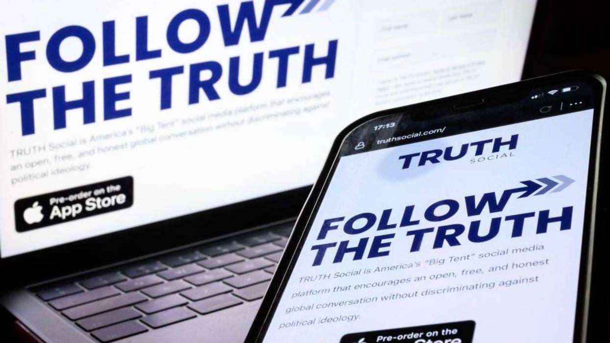In this photo illustration, the holding screen for the "Truth Social" platform and app is seen on Jan. 04, 2022 in London, England. Donald Trump's social platform launch this week for iPhones only. There's now word on when it will be available on Android phones.